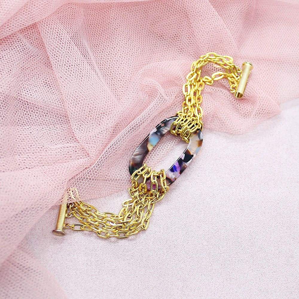 Multicolour Joss Gold Chain Bracelet on pink