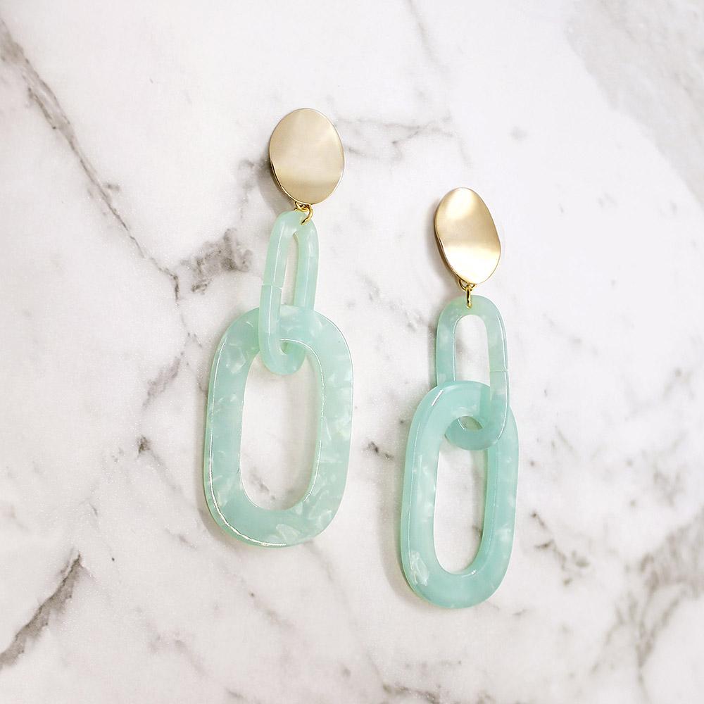 Mint Joss link earrings on white