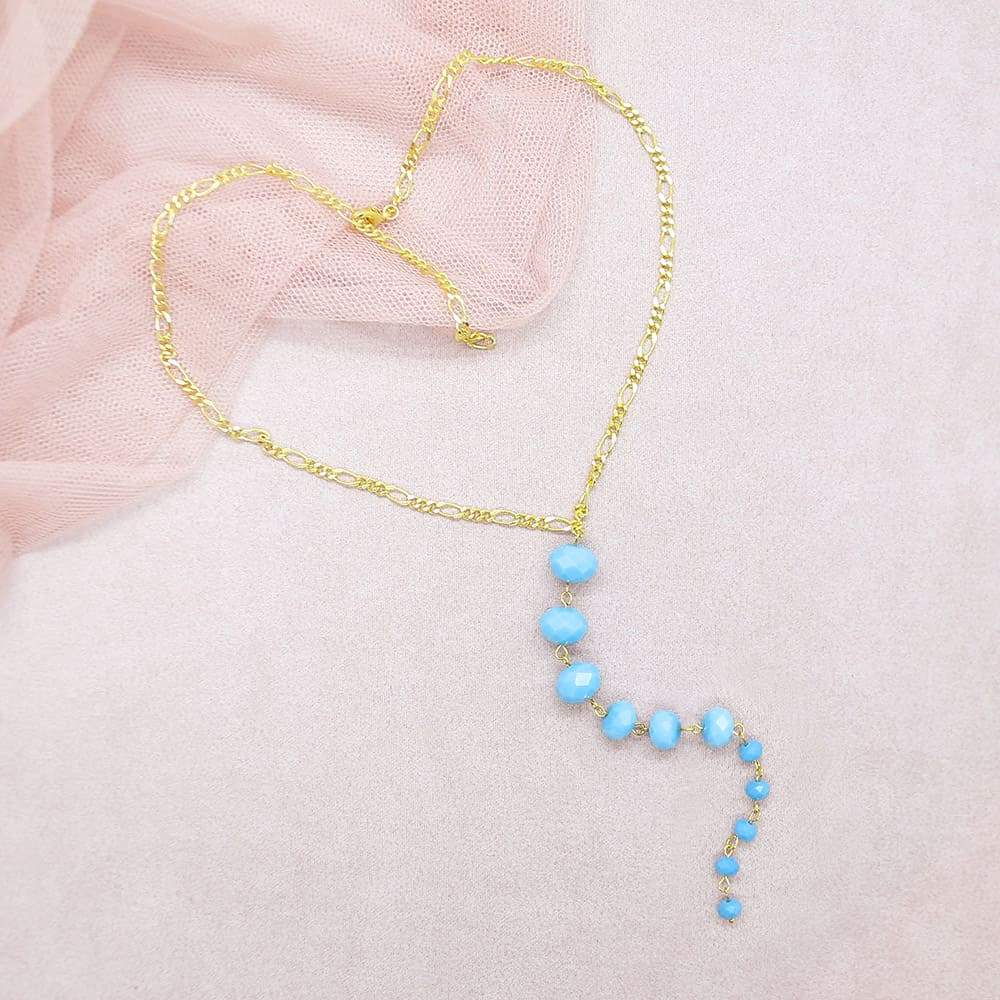 Turquoise Kelana Bohemian Backdrop Necklace on pink