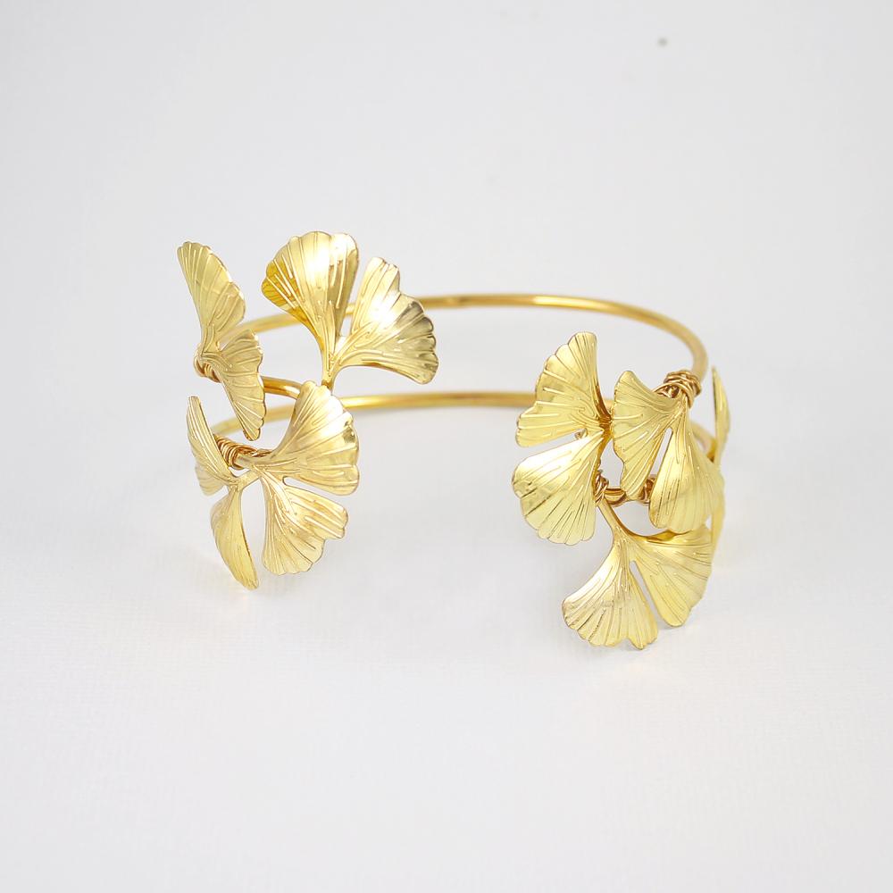 Gold Kiko Gingko Leaf Cuff Bracelet on grey