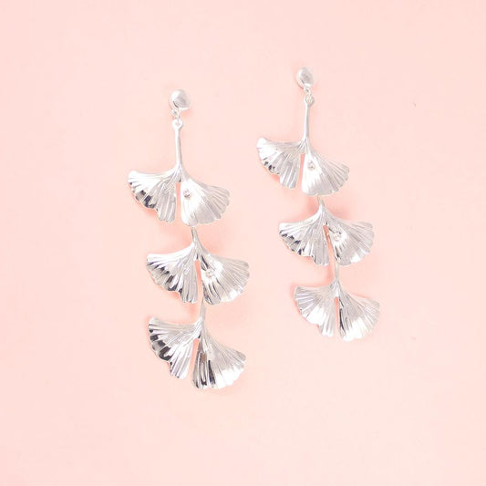 Silver Kiko Gingko Leaf Earrings on pink