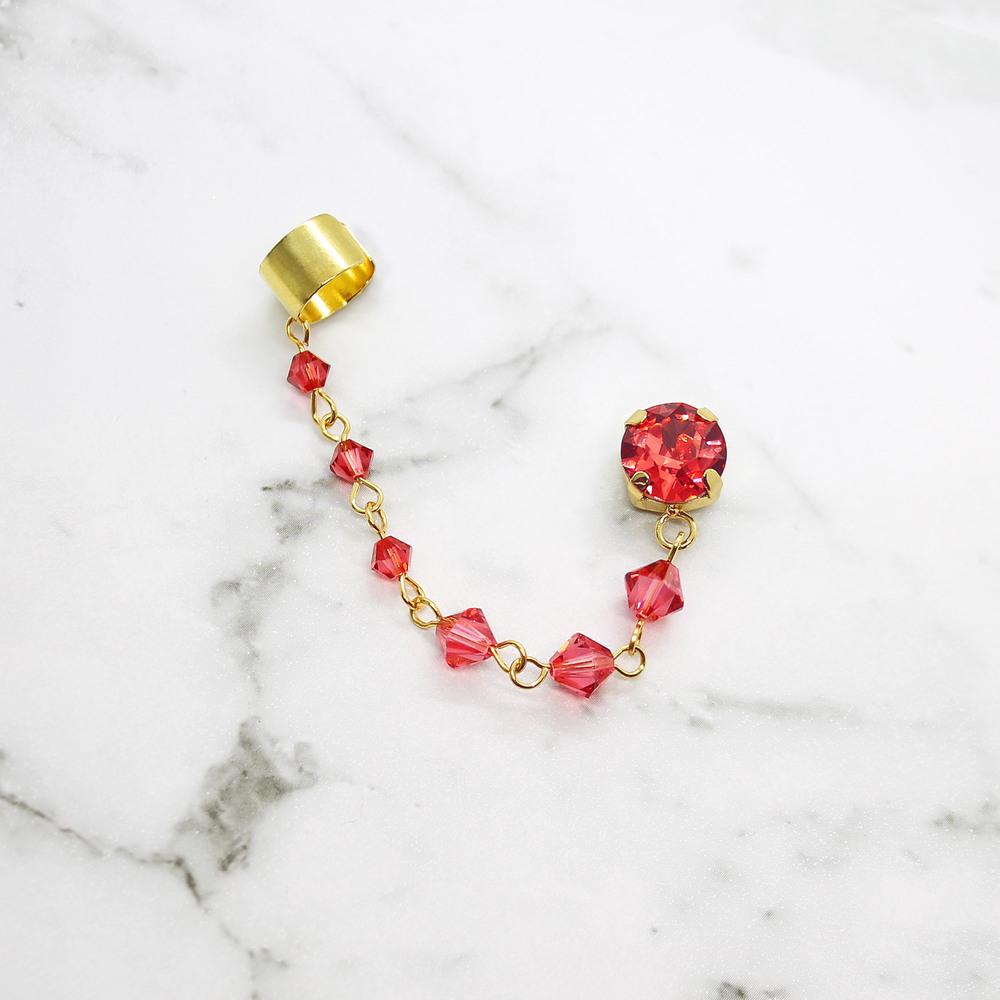Coral Kira Crystal Ear Climber on white