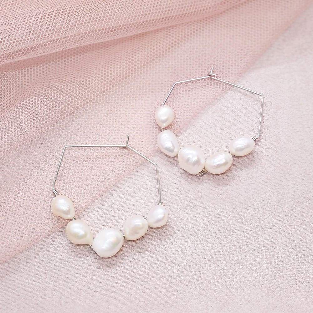 Kygo freshwater pearl geo earrings on pink