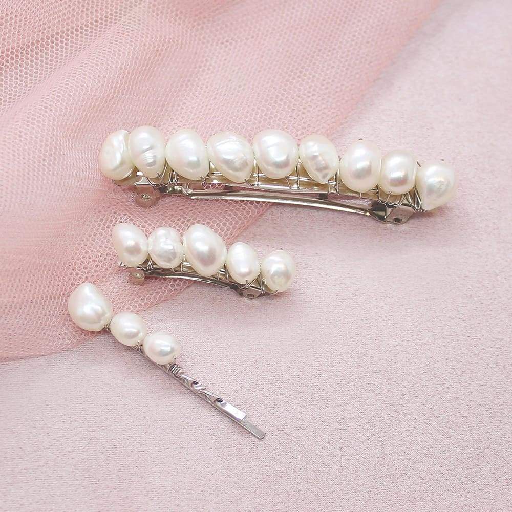 Kygo freshwater pearl hair pins set on pink