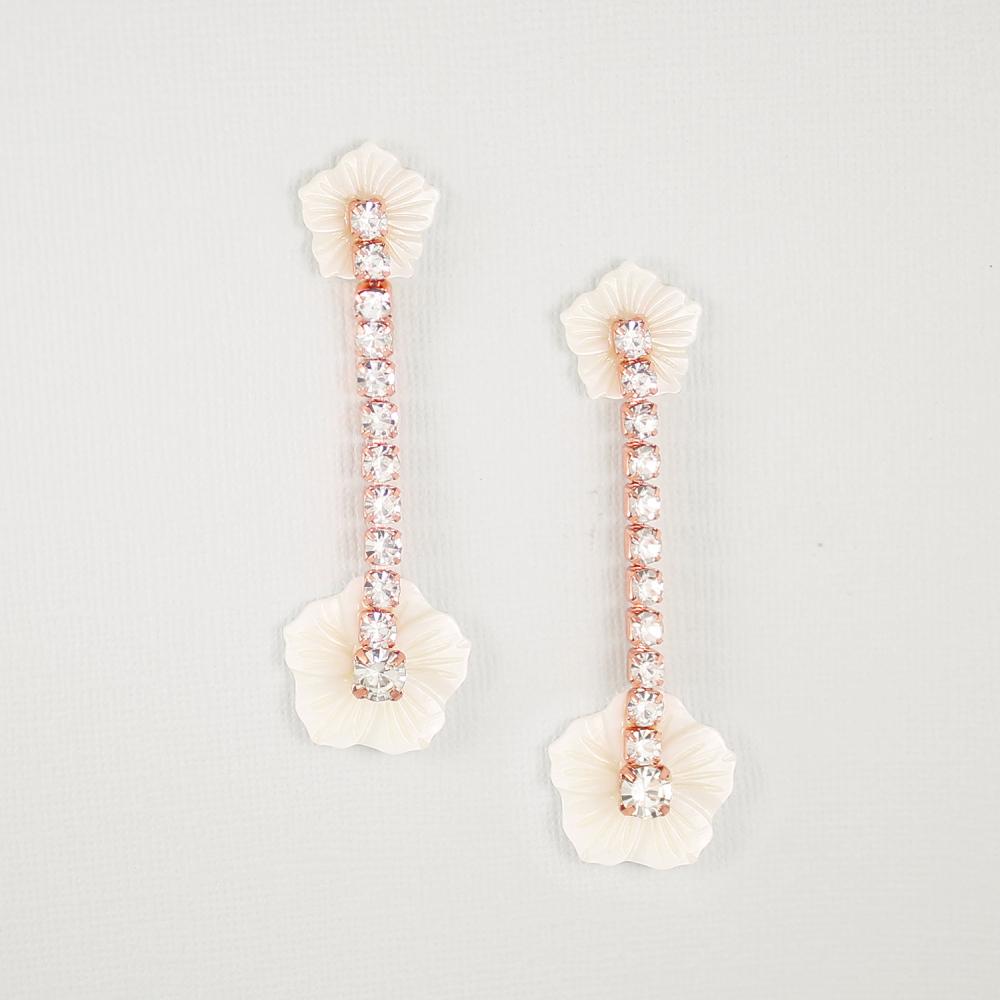 Rose gold Leilani Floral & Crystal Earrings on grey