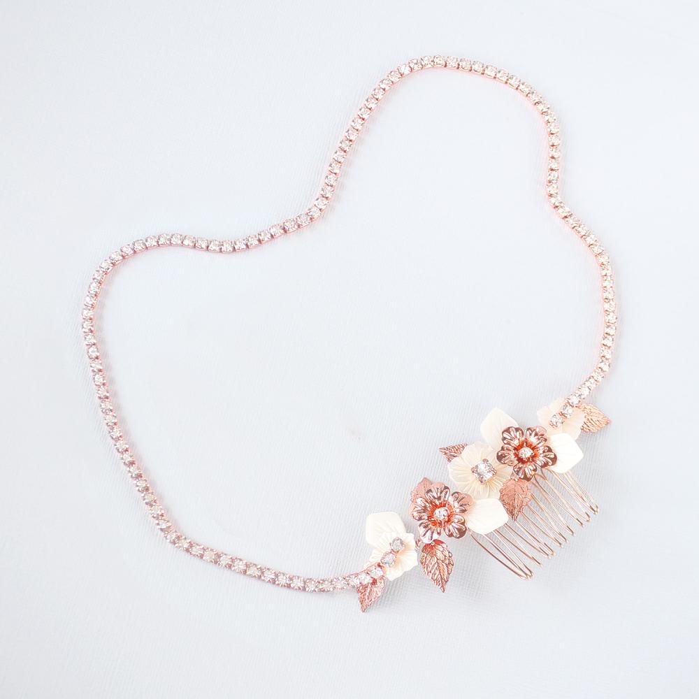 Rose gold Leilani Flower Bridal Comb & Crystal Chain on grey