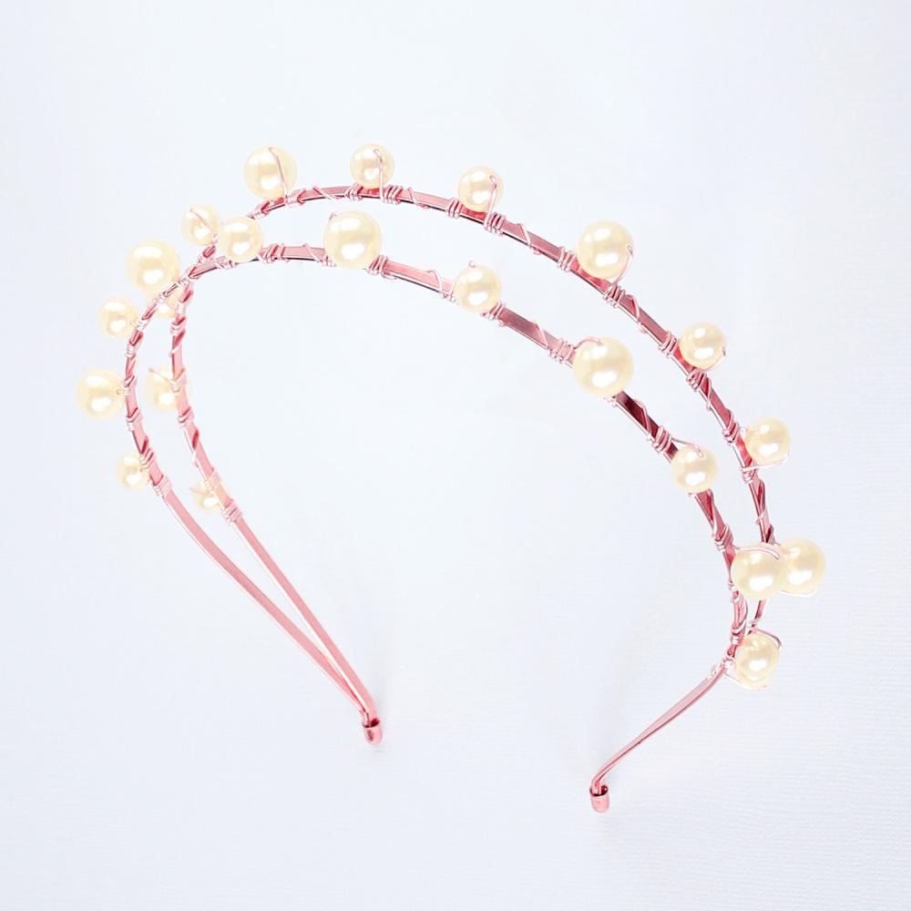 Rose gold Lulu Double Pearl Bridal Headband on grey