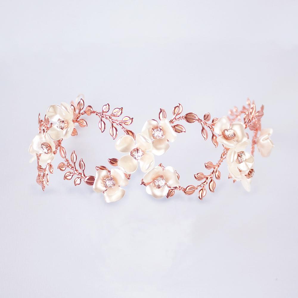 Rose gold Lyra Flower Bridal Crown on grey