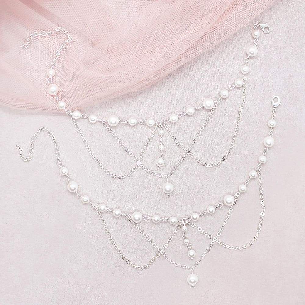 Off-white Ora Bridal Pearl Anklets on pink