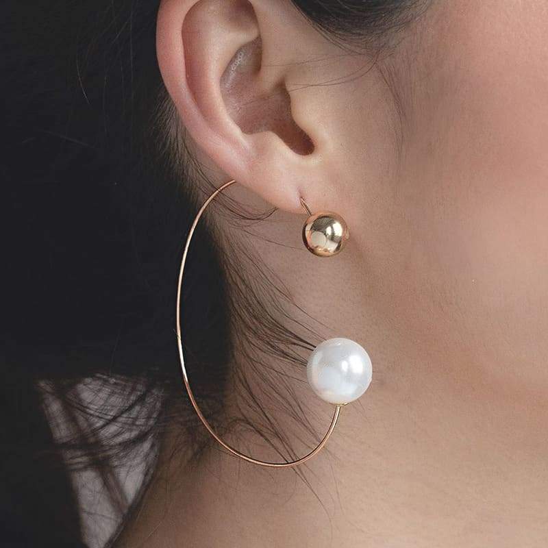 Rae Large Hoop and Pearl Ball Earrings on right ear
