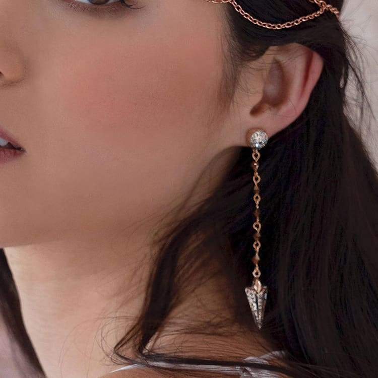 Ryda rose gold earrings on left
