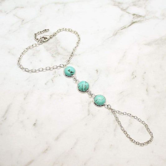 Skye Turquoise Hand Chain on grey