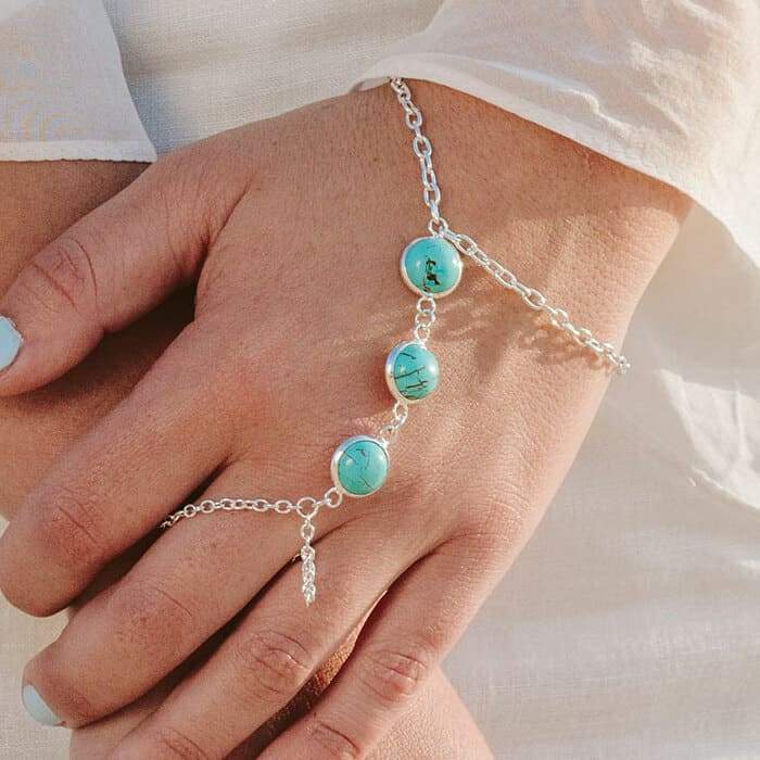 Skye Turquoise Hand Chain on left hand