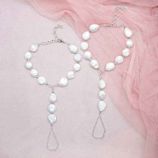 White Sloan Freshwater Pearl Barefoot Sandals on pink