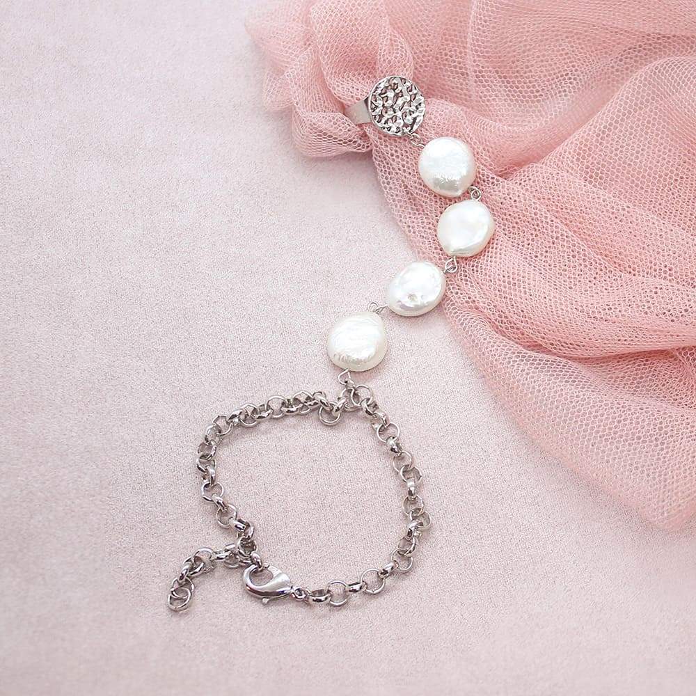 White Sloan Bohemian Bracelet Ring on pink