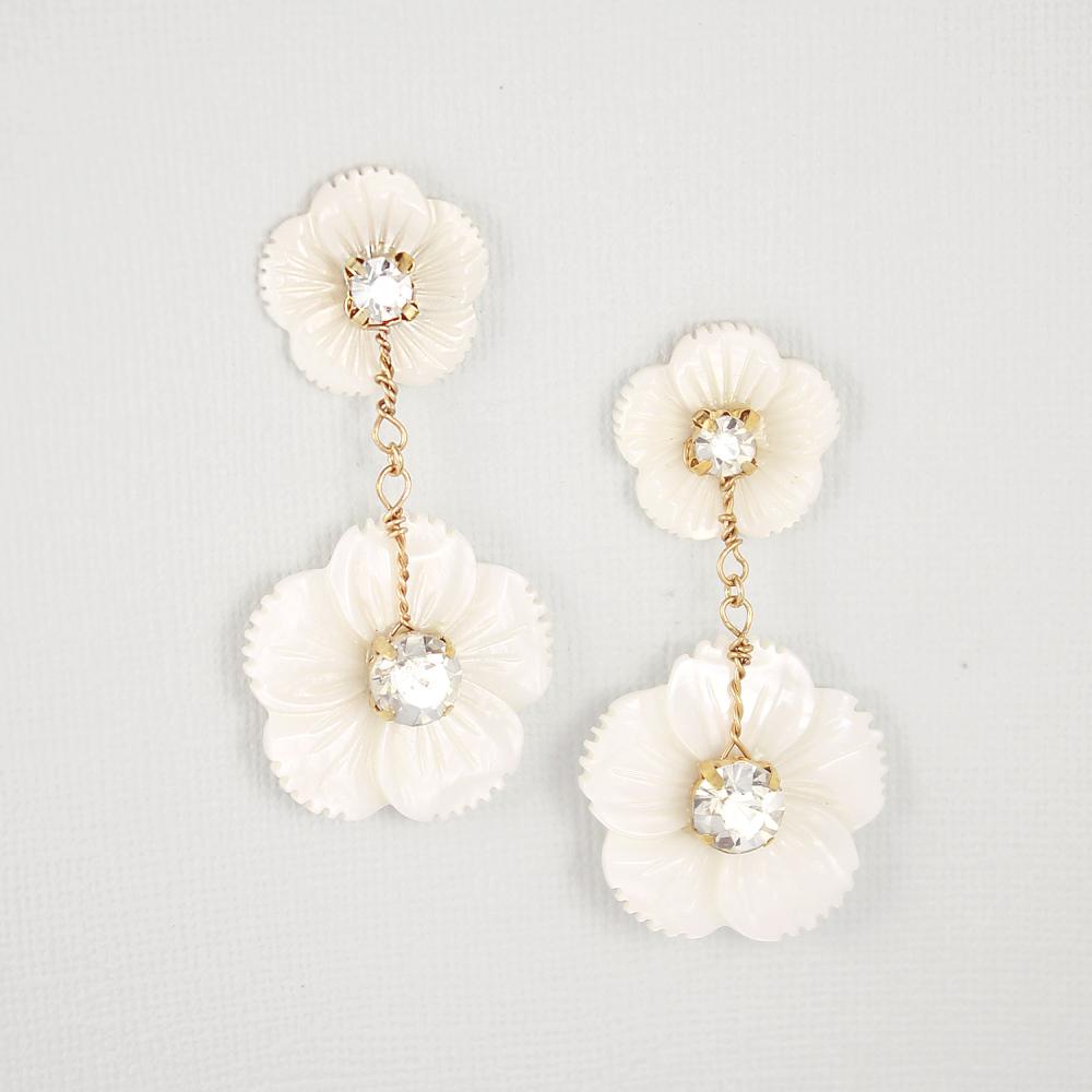 Gold Wanika Tropical Flower Bridal Earrings on grey