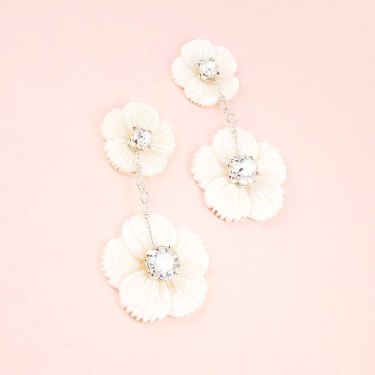 Silver Wanika Tropical Flower Bridal Earrings on pink