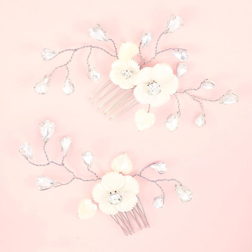 Silver Wanika Tropical Flower Bridal Hair Combs on pink