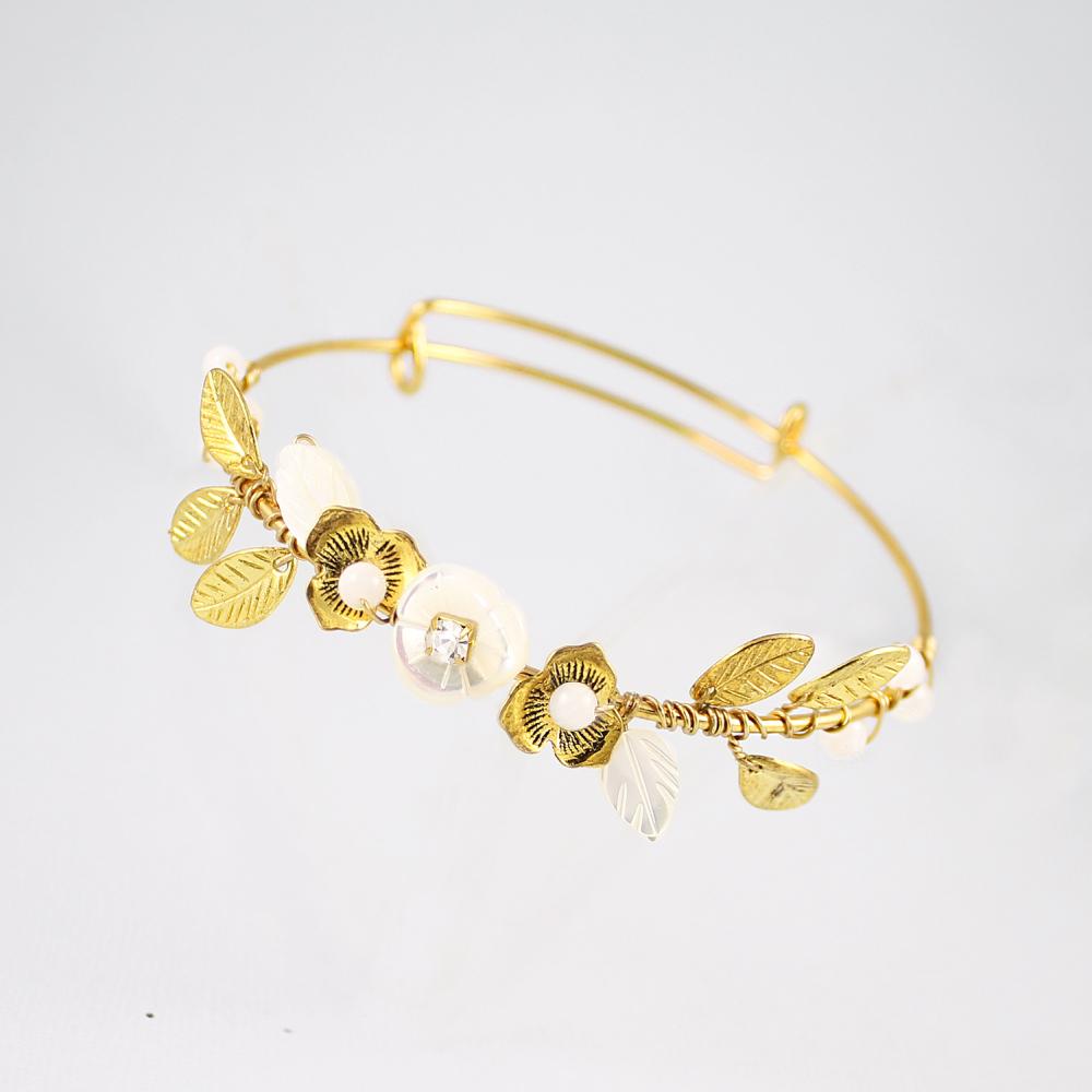 Gold Willa Flower Bridal Bracelet on grey